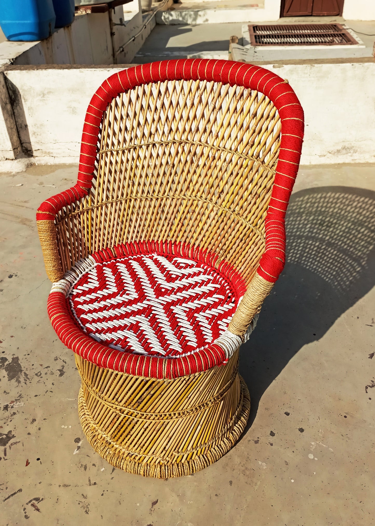 red bamboo chair for balcony