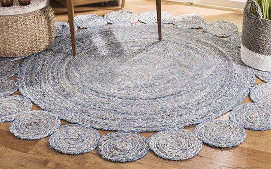 Round handwoven jute rug featuring an intricate braided pattern