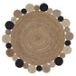 Handwoven round jute rug in a warm beige color