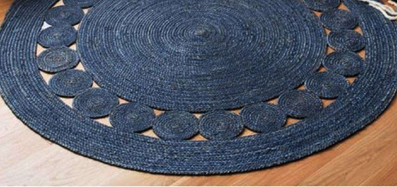 Handcrafted jute mat with a vibrant blue inner circle