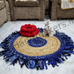 Handwoven beige jute rug with contrasting blue strips