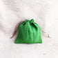 green jute potlis 