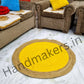 Round jute rug with cheerful yellow and calming beige stripes