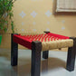 Wooden Chowki With Weaving Red and Beige Chess Borad